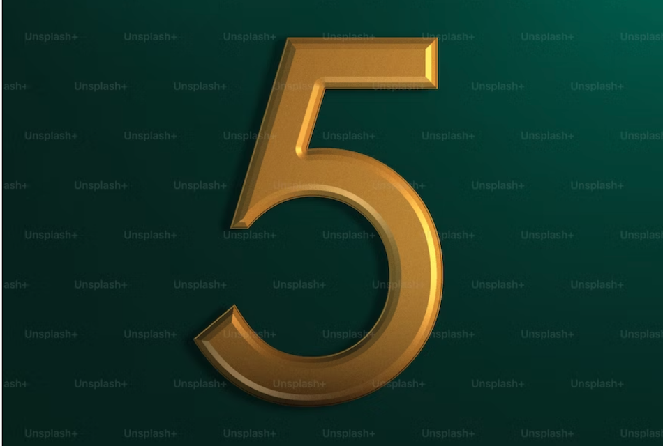 the number 5 in gold on a green background