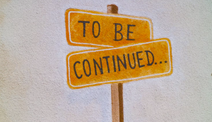 Corner street sign saying To Be Continued