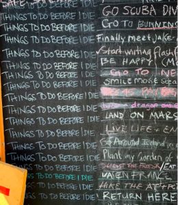 Chalkboard with someone's bucket list.