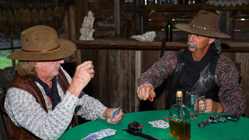 Two old guys playing poker.
