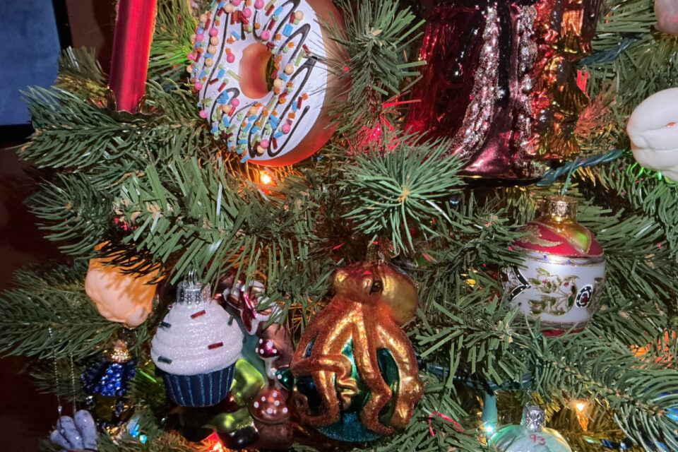 A photo of Christmas ornaments on a tree