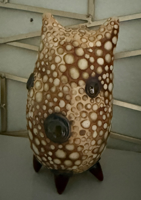 a whimsical monster shaped out of clay